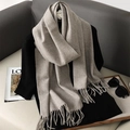 Light beige grey faux cashmere scarf with tassels styled on a black sweater base - Light Beige Gray