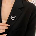 Silver bow brooch with heart zircon and pearl pendant pinned on black suit lapel - Bowknot Zircon Pearl Pendant Style