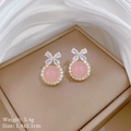 Detailed close-up of bowknot pink earrings with zircons on elegant silk background - Bowknot Pink Stud Earrings (A434)