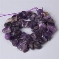 Strand of natural irregular amethyst raw stone beads in varying shades of purple - 15-20mm Nugget Stone