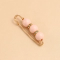 Detail of pink matte pearl brooch with rhinestone spacers on a golden metal safety pin - 5.8*1.5cm / Pink