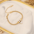 Gold stainless steel snake chain bracelet with sparkling crystal heart charm on marble tray - Heart Charm (2#)