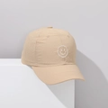 Detail of light khaki kids baseball cap with smiley face embroidery and laser-cut vents - 52-54cm / Smiley Khaki