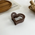 Close-up of minimalist heart-shaped hair claw clip in matte brown resin material - Heart / Dark Coffee