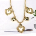 Golden bead chain necklace with white enamel hearts and hollow heart pendants - White