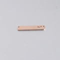 Detailed macro view of rose gold rectangle pendant with butterfly cutout design - 6x35mm Hollow Butterfly / Rose Gold