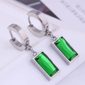 Detailed macro view of silver hoop earrings with rectangular emerald green gemstone charms - Silver Earrings