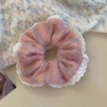 Detailed close-up of pink and purple tie-dye knit scrunchie with white lace trim - Lace Rainbow Red