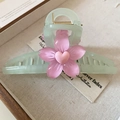 Pale green hair claw clip with pink cherry blossom design on wooden background - Green Large Flower Claw Clip (146#)