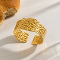 Golden wide open cuff bracelet with vintage lava texture and polished metallic finish - Gold Hammered Wide