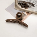 Macro detail of large mocha brown matte hair claw clip with cross spiral design - Cross / Dark Coffee
