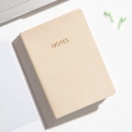 Portable beige A6 notebook with faux leather texture and golden NOTES lettering - Yellow / Line