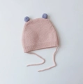 Pink knitted baby earflap hat with blue plush pompoms and adjustable chin straps - Cap circumference 40-48cm, suitable for 3-18 months / Candy Ball Pink