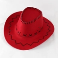 Detail view of a red cowboy hat with black hand-stitched edges and metal ventilation holes - Red