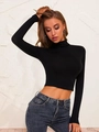 Slim fit black long sleeve turtleneck cropped top shirt for women on a model - S / Black