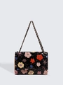 Shoulder bag with colorful floral sequins and woven chain strap on a black base - Contrast Floral