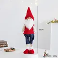 60cm tall festive Christmas gnome decoration in red and blue knitwear on white base - Standing Santa Claus in Red Sweater