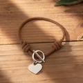 Handcrafted brown woven rope couple bracelet with silver OT clasp and heart charm - Brown Braided Rope - OT Buckle - Heart Pendant