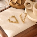 Detailed close-up of golden triangular beaded earrings on a beige fabric within a wooden tray - Inverted Triangle Beaded Hoop (ZHE480金)