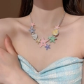 Detail of colorful starfish and shell charms necklace on a female model neck - Multicolor Starfish Shell Pendant (21#)