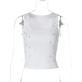 Detail of white ribbed knit tank top featuring transparent teardrop bead decorations - White