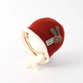 Detail of red knit baby hat with white faux fur lining and checkered bow decoration - Approx. 3-6 Years / Burgundy