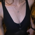 Silver layered cross necklace with liquid metal texture shown on a female model - Silver (Two-piece Set)