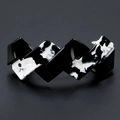 Eleganter großer Haarclip aus Acetat mit schwarz-weißem Marmormuster und geometrischem Design - Kuhmuster