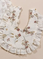 Floral print cotton muslin baby bib with ruffle edges and snap closure for infants - Red Flower