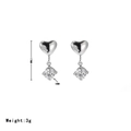 Silver heart stud earrings with dangling zircon pendant showing 17mm height dimensions - Silver/Platinum
