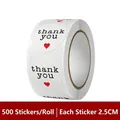 Detail view of round 'Thank You' roll stickers, 2.5cm diameter with 500 pieces per roll - Minimalist Thank You Pattern (C60)