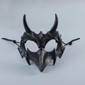 Macro detail of black demon half mask with textured finish and horn design for Halloween - Yaksha Black