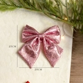 Pink Christmas bow with shiny sequins and 25x20cm dimensions on festive background - Pink 20X25CM Sequin Bow