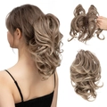Short wavy claw clip ponytail extension in ash brown with blonde highlights - Ash Blonde (8T16)