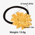 Gros plan sur l'élastique à cheveux avec pendentif marguerite dorée et dimensions - Doré