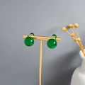 Green faux jade bead stud earrings with gold accents on display stand - E4132-2/Green Simple Ball