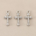 Close-up of three silver Baroque cross pendants with inlaid sparkling zircon stones - US Size 6 / 1.3*0.6cm / Silver