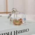 Creative Capybara liquid keychain with brown figure and colorful beads in square bottle - Noctilucent Capybara-Apple