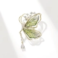Exquisite golden butterfly brooch featuring translucent green wings and zircon teardrop charm - Style 76/Emerald Glass Water Drop Pendant