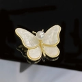 Elegant gold-tone butterfly brooch with white pearl and iridescent mother of pearl wings - Golden Shell Butterfly