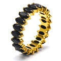 Detail of 18k gold eternity ring featuring oval-cut black stones in 4-prong setting - Gold + Black Zirconia