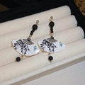 Detail of fan-shaped earrings with bamboo painting and black beads on velvet - Silver Needle - Ink Wash Fan Earrings