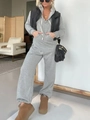 Women's gray hooded one-piece tracksuit paired with a black vest and brown boots - S / Top And Bottom / Gray