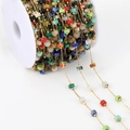 Bohemian style gold-plated copper chain with colorful stone beads on a white reel - Gold Chain - Multicolor