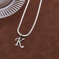 Silver stainless steel snake chain necklace featuring a polished capital letter K pendant - Letter K