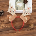Christmas reindeer antler headband with gold glitter horns and red bells on wooden table - Gold Plush Antler Headband
