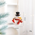 Resin snowman Christmas ornament with red heart and gold star details, 8.7cm height - Snowman with Star