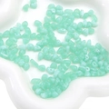 Irregular mint green acrylic beads in a cloud tray for DIY jewelry making - Jelly Green