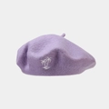 Detail of light purple wool beret with white coconut tree embroidery and textured fabric - Light Purple