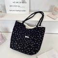 Sac cabas noir en velours côtelé avec motifs nœuds blancs et poche avant - Noir